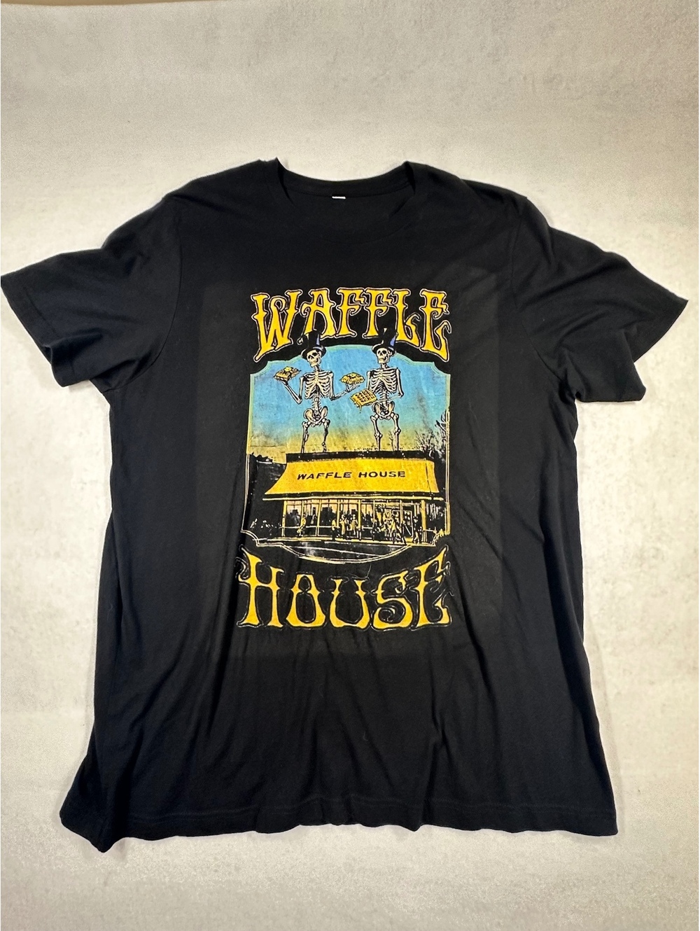 Waffle House Black Graphic T-Shirt with Skeleton Design